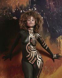 Black beauties get artistic with body paint - oozing sex appeal. Photo #2