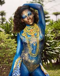 Black beauties get artistic with body paint - oozing sex appeal. Photo #6